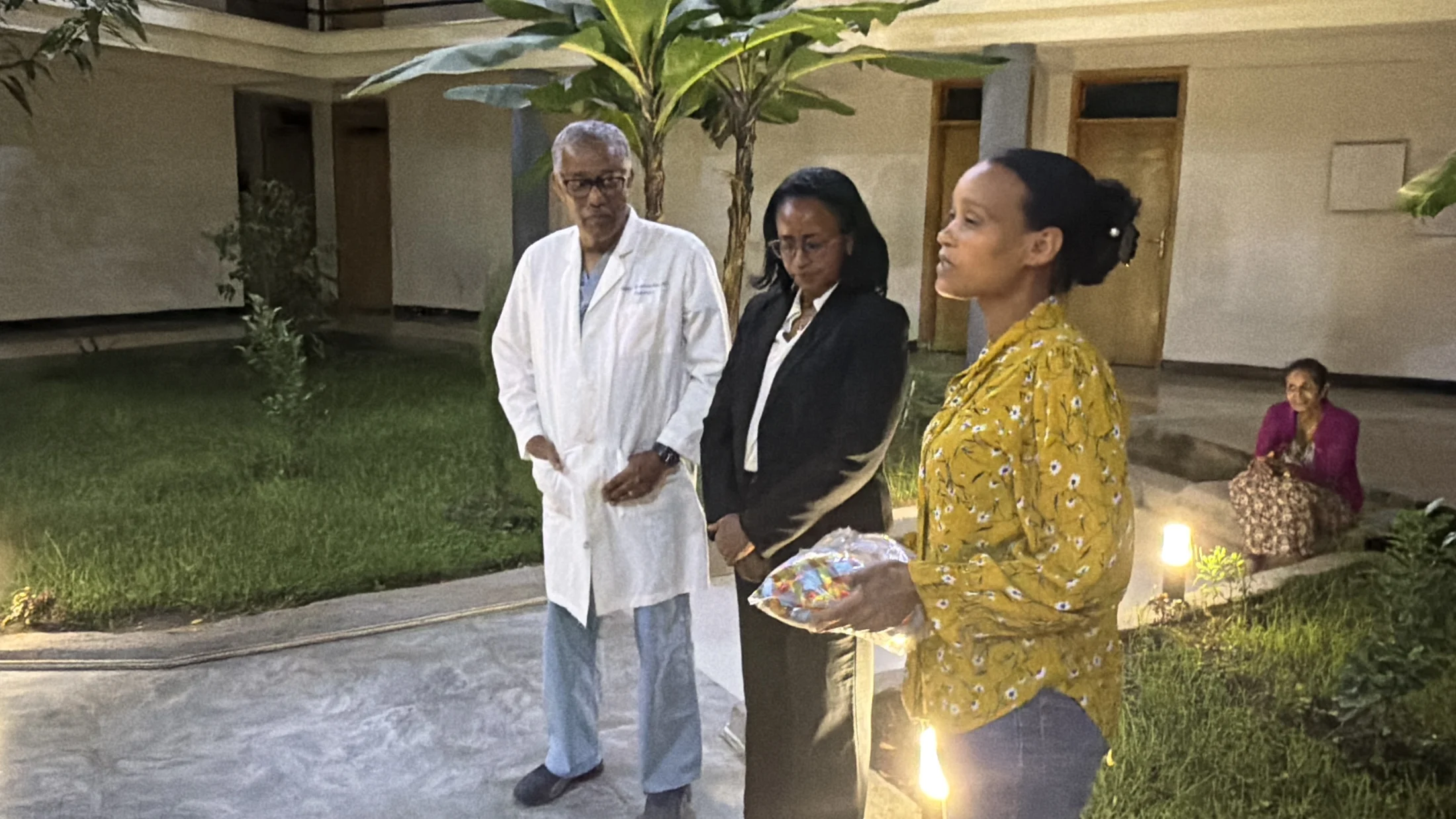 Team members gathered outside during the visit