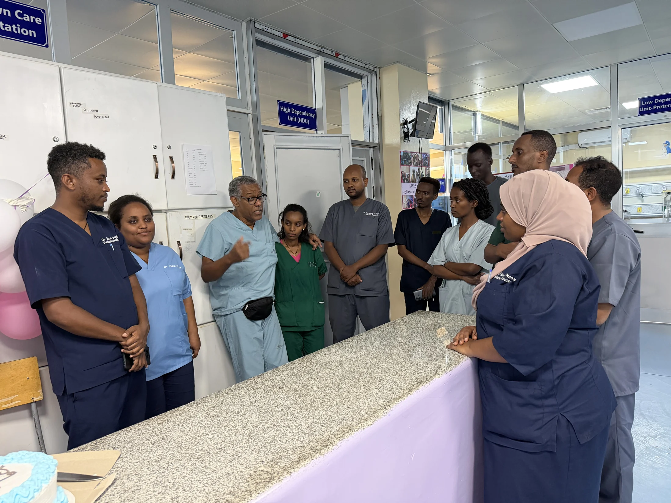 The medical team gathered for a discussion in the neonatal unit