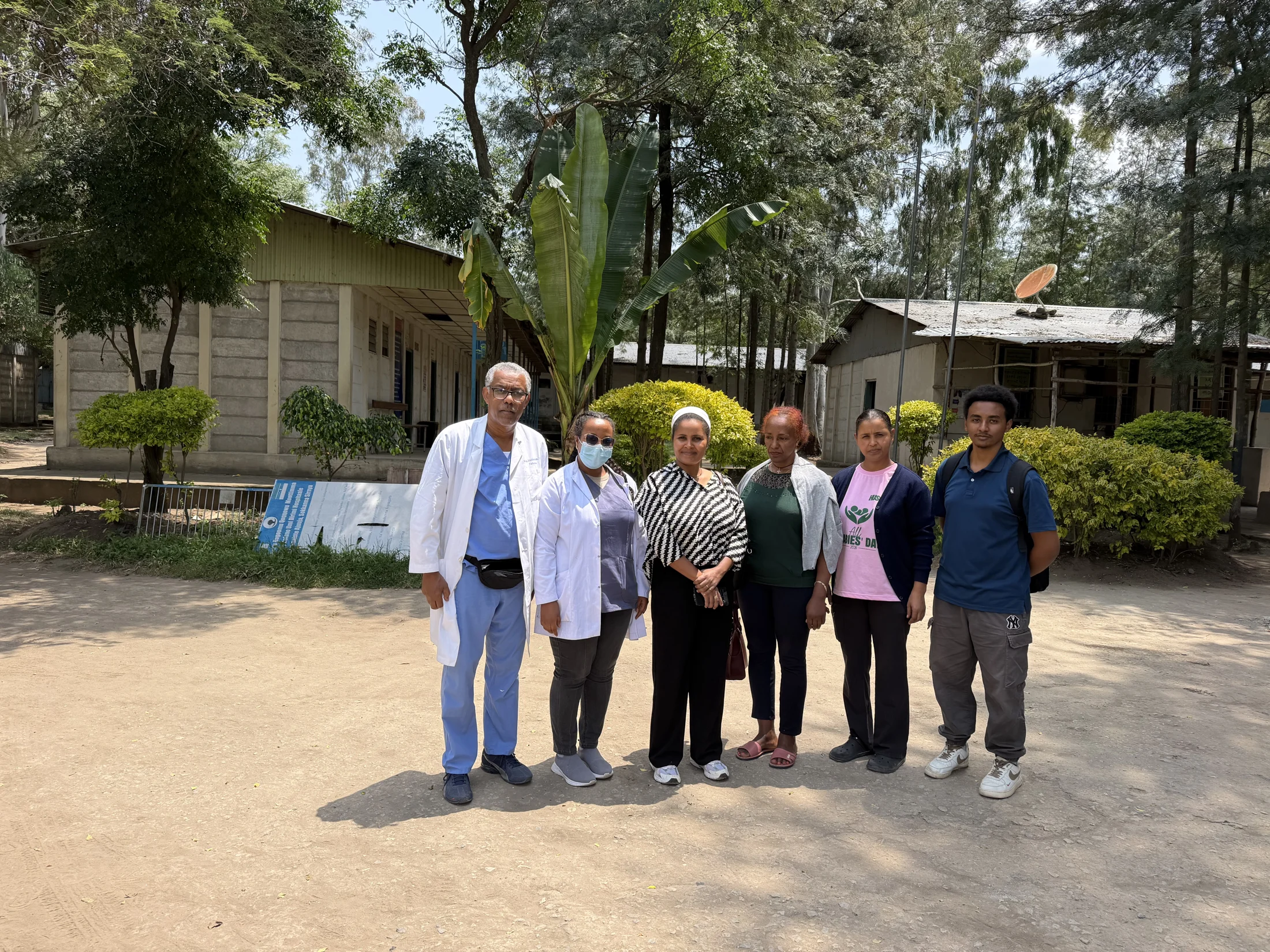 The team together on the hospital grounds